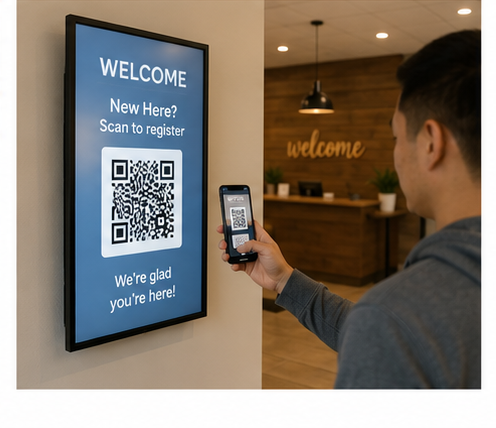Church lobby screen showing a QR code with a visitor scanning it on their phone